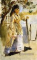 femme par une clôture Pierre Auguste Renoir